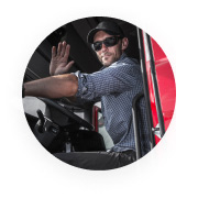 image of man in truck waving